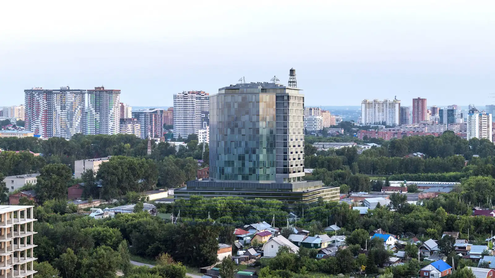 High-quality 3D aerial exterior visualization of a modern high-rise skyscraper with a reflective glass facade, rising above a sprawling urban landscape of low-rise neighborhoods, green trees, and distant high-rise towers.