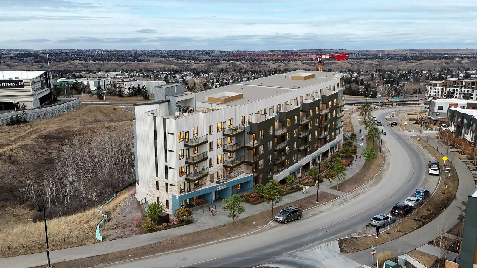 High-quality 3D aerial exterior visualization of a modern mid-rise apartment building seamlessly integrated into a drone photograph, featuring a mixed white and dark grey facade, balconies, ground-level landscaping, and a curved road with parked cars.